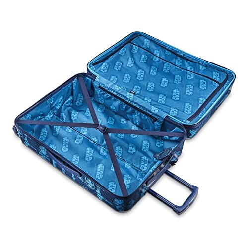 Open blue Star Wars themed suitcase with logo pattern inside