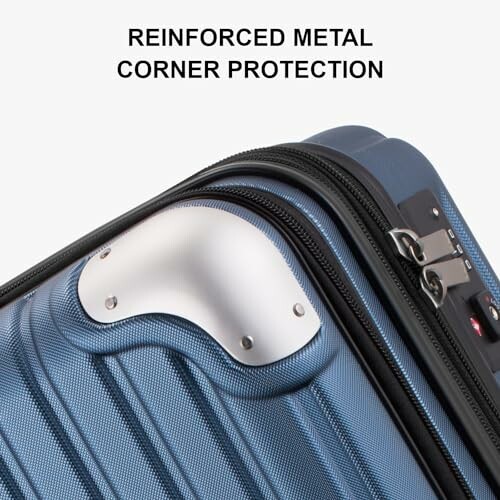 Close-up of a suitcase with reinforced metal corner protection.